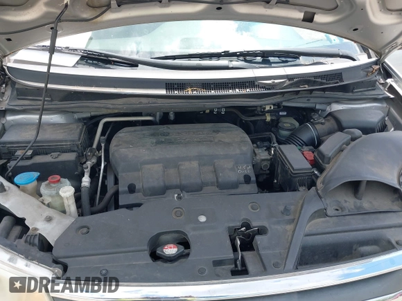 2012 Honda Odyssey EX-L with VIN 5FNRL5H67CB139701, listed as a IAAI auction lot 42233283 with 147,143 mi miles and . Bid and sale history available at DreamBid. Image 10.