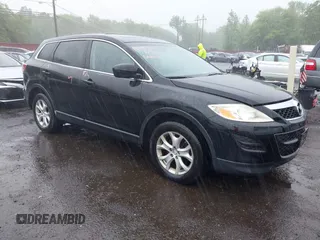 2012 Mazda CX-9 Sport with VIN JM3TB3BV2C0340005, listed as a IAAI auction lot 42264763 with 135,495 mi miles and . Bid and sale history available at DreamBid. Image 1.