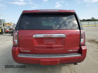 2015 GMC Yukon Denali with VIN 1GKS2CKJ6FR136152, listed as a Copart auction lot 76967664 with 137,208 mi miles and Salvage Title. Bid and sale history available at carsss.com. Image 6.
