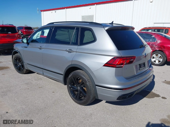 2023 Volkswagen Tiguan SE R-Line Black with VIN 3VVCB7AX7PM137019, listed as a IAAI auction lot 40731252 with 20,098 mi miles. Bid and sale history available at carsss.com. Image 3.