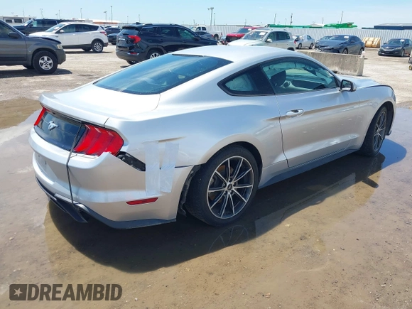 2018 Ford Mustang EcoBoost with VIN 1FA6P8THXJ5128830, listed as a IAAI auction lot 42192673 with 58,817 mi miles and . Bid and sale history available at DreamBid. Image 4.