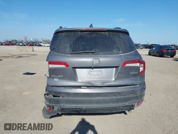 2021 Honda Pilot Special Edition with VIN 5FNYF5H27MB040801, listed as a IAAI auction lot 41656669 with 54,764 mi miles and . Bid and sale history available at DreamBid. Image 16.