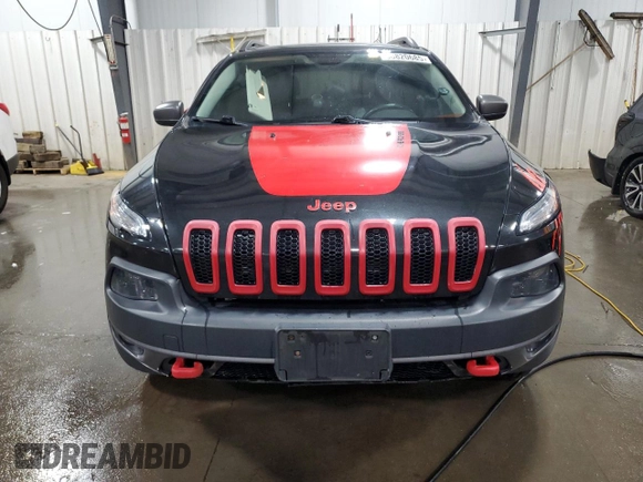2015 Jeep Cherokee Trailhawk with VIN 1C4PJMBS5FW587545, listed as a Copart auction lot 58820685 with 136,755 mi miles and Salvage title. Bid and sale history available at DreamBid. Image 5.