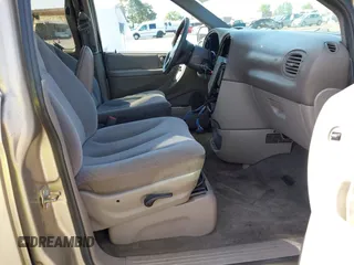 2003 Dodge Caravan Sport with VIN 2D4GP44R73R279132, listed as a IAAI auction lot 42100140 with 218,201 mi miles and . Bid and sale history available at carsss.com. Image 5.