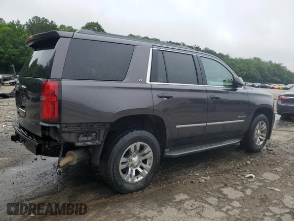 2018 Chevrolet Tahoe LT with VIN 1GNSKBKC8JR268689, listed as a Copart auction lot 58199955 with 131,906 mi miles and Salvage title. Bid and sale history available at DreamBid. Image 3.