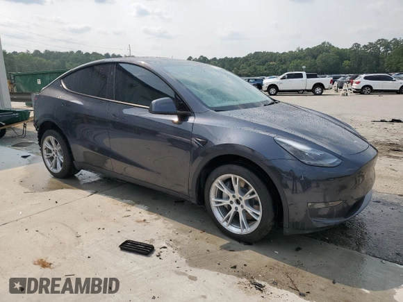 2024 Tesla Model Y Long Range with VIN 7SAYGDEE0RA255613, listed as a Copart auction lot 58993085 with 39,336 mi miles and Salvage title. Bid and sale history available at DreamBid. Image 4.