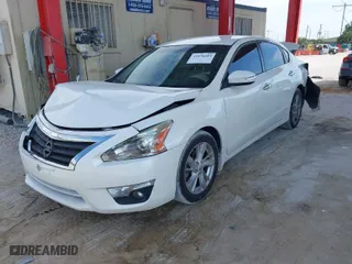 2015 Nissan Altima 2.5 SL with VIN 1N4AL3AP0FN339562, listed as a IAAI auction lot 41876685 with 127,493 mi miles. Bid and sale history available at carsss.com. Image 2.