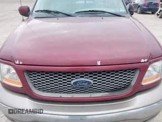 2003 Ford F-150 XL with VIN 1FTRX18L43NA96018, listed as a IAAI auction lot 41871947 with 208,517 mi miles. Bid and sale history available at carsss.com. Image 6.