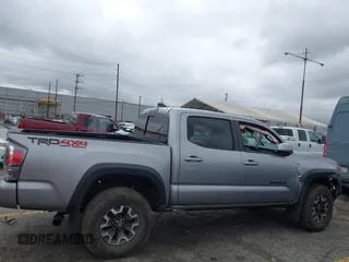 2021 Toyota Tacoma SR z VIN 3TMCZ5AN3MM374132, wystawiony jako IAAI lot #42068562 z przebiegiem 38 654 mil mil oraz . Historia ofert i sprzedaży dostępna na DreamBid. Obrazek 14.