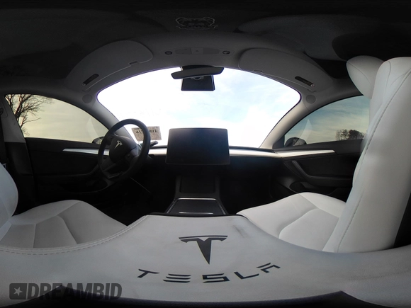 2023 Tesla Model 3 Long Range with VIN 5YJ3E1EB6PF673532, listed as a IAAI auction lot 41885716 with 39,690 mi miles and . Bid and sale history available at DreamBid. Image 21.