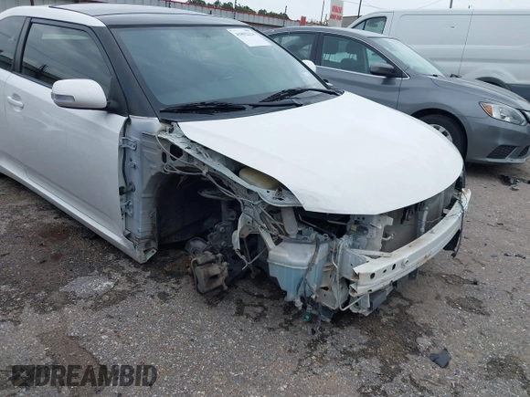 2013 Scion tC z VIN JTKJF5C70D3058888, wystawiony jako IAAI lot #41892224 z przebiegiem 84 749 mil mil oraz . Historia ofert i sprzedaży dostępna na DreamBid. Obrazek 18.