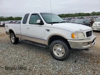 1998 Ford F-150 XL with VIN 1FTRX18L7WNB60346, listed as a Copart auction lot 51526795 with 290,180 mi miles and Salvage title. Bid and sale history available at DreamBid. Image 4.