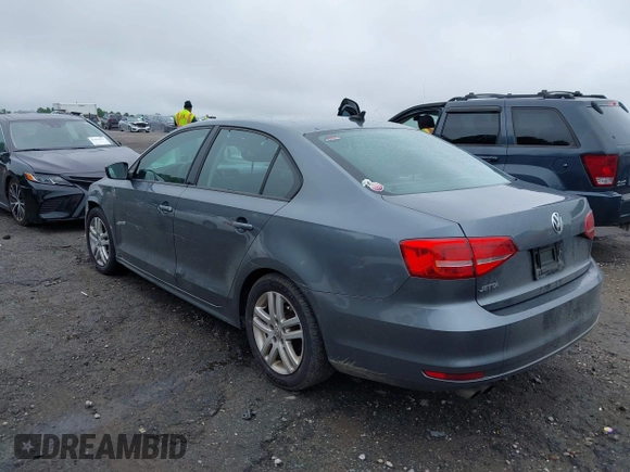 2015 Volkswagen Jetta S z VIN 3VW2K7AJ6FM217381, wystawiony jako IAAI lot #42371909 z przebiegiem 237 510 mil mil oraz . Historia ofert i sprzedaży dostępna na DreamBid. Obrazek 3.