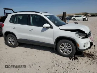 2017 Volkswagen Tiguan S with VIN WVGBV7AX8HK028302, listed as a Copart auction lot 52617685 with 108,191 mi miles and Salvage Title. Bid and sale history available at DreamBid. Image 4.