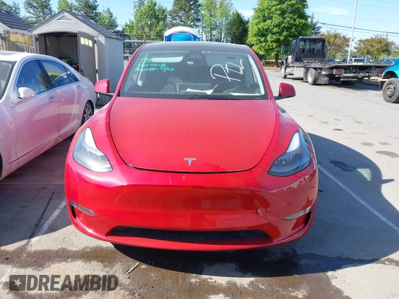 2023 Tesla Model Y Long Range with VIN 7SAYGDEEXPA182702, listed as a IAAI auction lot 42023730 with Not provided miles and . Bid and sale history available at DreamBid. Image 12.