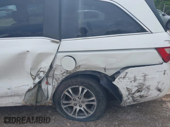 2012 Honda Odyssey EX-L with VIN 5FNRL5H63CB117341, listed as a IAAI auction lot 42197815 with 256,544 mi miles and . Bid and sale history available at DreamBid. Image 6.