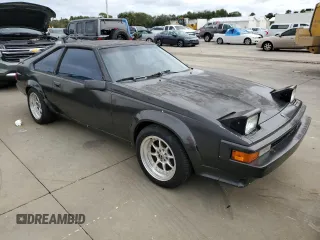 1985 Toyota Supra z VIN JT2MA67L3F0151708, wystawiony jako Copart lot #74672844 z przebiegiem 60 346 mil mil oraz Szkoda całkowita • Salvage title. Historia ofert i sprzedaży dostępna na DreamBid. Obrazek 4.