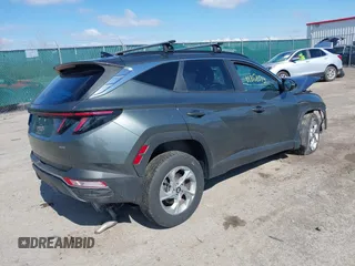2022 Hyundai Tucson SEL with VIN 5NMJBCAE5NH137470, listed as a IAAI auction lot 41868573 with 28,034 mi miles and . Bid and sale history available at carsss.com. Image 4.
