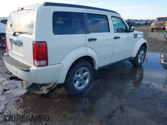 2008 Dodge Nitro SLT with VIN 1D8GT58K68W288772, listed as a IAAI auction lot 41621789 with 187,410 mi miles. Bid and sale history available at carsss.com. Image 4.