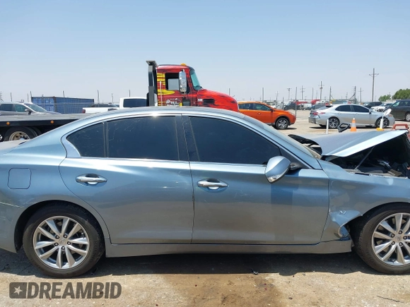 2015 Infiniti Q50 z VIN JN1BV7AP2FM357716, wystawiony jako IAAI lot #42504273 z przebiegiem 74 608 mil mil oraz . Historia ofert i sprzedaży dostępna na DreamBid. Obrazek 14.