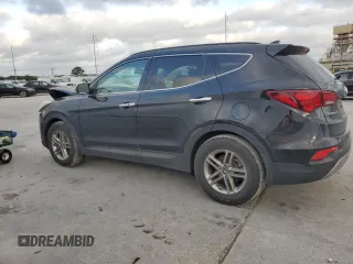 2018 Hyundai Santa Fe 2.4L with VIN 5XYZUDLB3JG515991, listed as a Copart auction lot 56762965 with 51,413 mi miles and Salvage title. Bid and sale history available at DreamBid. Image 2.