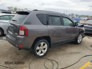 2014 Jeep Compass Latitude with VIN 1C4NJDEB4ED904731, listed as a Copart auction lot 51809165 with 104,760 mi miles and Salvage Title. Bid and sale history available at DreamBid. Image 3.