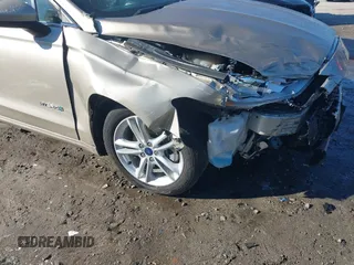 2018 Ford Fusion S z VIN 3FA6P0UU8JR271589, wystawiony jako IAAI lot #41318471 z przebiegiem 148 793 mil mil oraz . Historia ofert i sprzedaży dostępna na DreamBid. Obrazek 12.