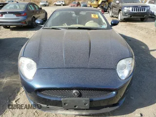 2009 Jaguar XK with VIN SAJWA43B995B30780, listed as a Copart auction lot 79119264 with 0 mi miles and Salvage Title. Bid and sale history available at carsss.com. Image 5.