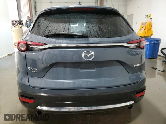 2023 Mazda CX-9 Grand Touring with VIN JM3TCBDY0P0640629, listed as a Copart auction lot 49310145 with 52,425 mi miles and Clean Title. Bid and sale history available at DreamBid. Image 6.