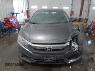 2018 Honda Civic EX-T with VIN JHMFC1F35JX031132, listed as a IAAI auction lot 41591028 with 111,087 mi miles and . Bid and sale history available at DreamBid. Image 12.