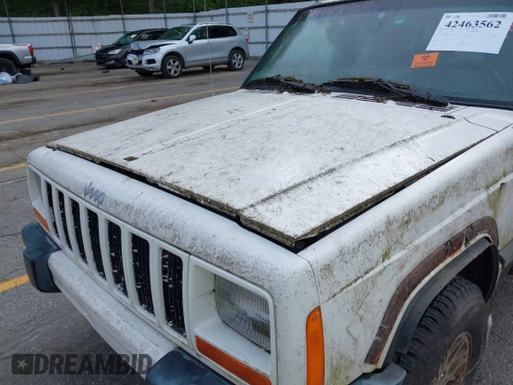 1999 Jeep Cherokee Sport z VIN 1J4FF68S0XL663735, wystawiony jako IAAI lot #42463562 z przebiegiem Nie podano mil oraz . Historia ofert i sprzedaży dostępna na DreamBid. Obrazek 10.