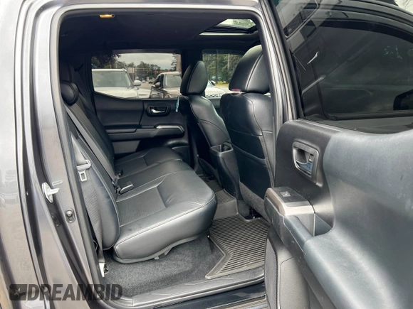 2022 Toyota Tacoma Limited with VIN 3TMGZ5AN7NM458988, listed as a Copart auction lot 65398105 with 32,115 mi miles and Salvage title. Bid and sale history available at DreamBid. Image 6.