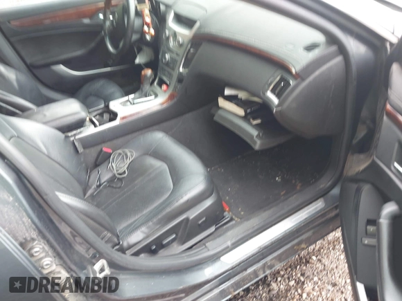 2009 Cadillac CTS AWD z VIN 1G6DT57V790133622, wystawiony jako IAAI lot #42272929 z przebiegiem 124 695 mil mil oraz . Historia ofert i sprzedaży dostępna na DreamBid. Obrazek 5.