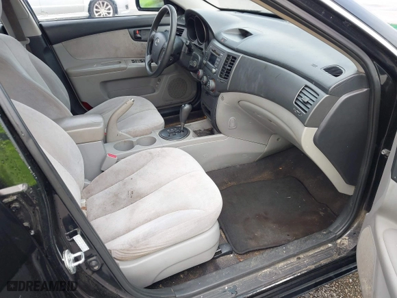 2010 Kia Optima LX with VIN KNAGG4A85A5375227, listed as a IAAI auction lot 42019118 with 221,324 mi miles. Bid and sale history available at carsss.com. Image 5.