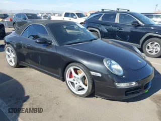 2006 Porsche 911 Carrera S z VIN WP0CB29926S766068, wystawiony jako IAAI lot #42013945 z przebiegiem 63 436 mil mil oraz . Historia ofert i sprzedaży dostępna na DreamBid. Obrazek 1.