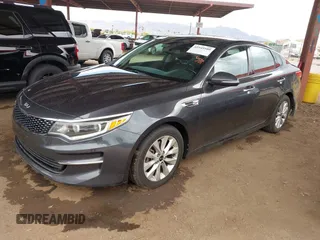 2017 Kia Optima EX with VIN 5XXGU4L36HG125627, listed as a IAAI auction lot 41949580 with 123,548 mi miles. Bid and sale history available at carsss.com. Image 2.