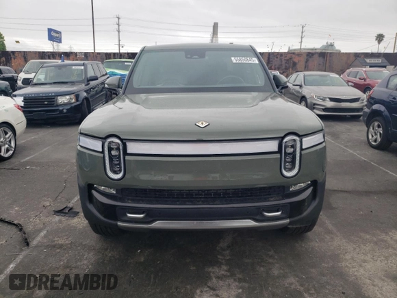2022 Rivian R1T Launch Edition z VIN 7FCTGAAL0NN001256, wystawiony jako Copart lot #55850845 z przebiegiem 49 236 mil mil oraz Szkoda całkowita • Salvage title. Historia ofert i sprzedaży dostępna na DreamBid. Obrazek 5.