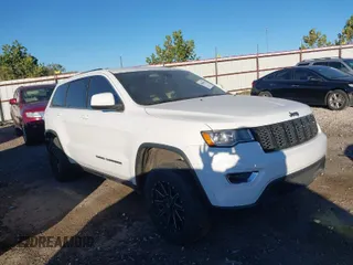 2017 Jeep Grand Cherokee Laredo with VIN 1C4RJEAG1HC903264, listed as a IAAI auction lot 40606675 with 144,106 mi miles. Bid and sale history available at carsss.com. Image 1.