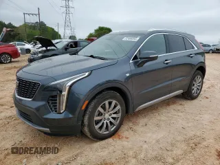 2021 Cadillac XT4 AWD Premium Luxury z VIN 1GYFZDR4XMF000937, wystawiony jako Copart lot #52406055 z przebiegiem 46 881 mil mil oraz Szkody całkowita. Historia ofert i sprzedaży dostępna na DreamBid. Obrazek 1.