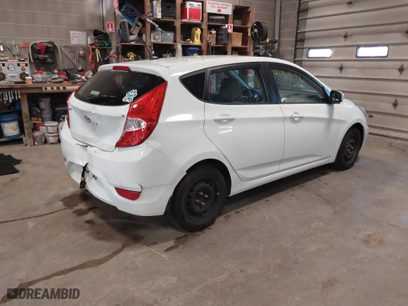 2013 Hyundai Accent GL with VIN KMHCT5AE1DU088241, listed as a IAAI auction lot 41909194 with 87,622 mi miles. Bid and sale history available at carsss.com. Image 4.