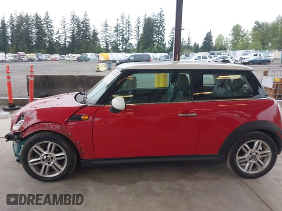 2012 MINI Hardtop with VIN WMWSU3C58CT262077, listed as a IAAI auction lot 42140178 with 70,099 mi miles and . Bid and sale history available at DreamBid. Image 15.