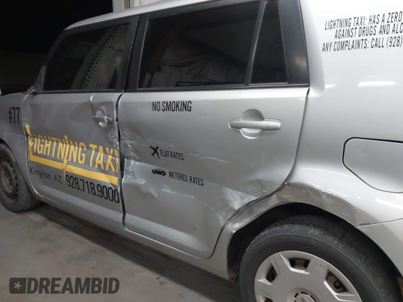 2012 Scion xB with VIN JTLZE4FE5CJ028608, listed as a IAAI auction lot 41916318 with 233,007 mi miles. Bid and sale history available at carsss.com. Image 13.