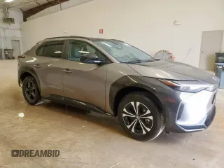 2024 Toyota bZ4X XLE with VIN JTMAAAAA1RA050959, listed as a Copart auction lot 66260445 with 11,813 mi miles and Clean title. Bid and sale history available at DreamBid. Image 4.