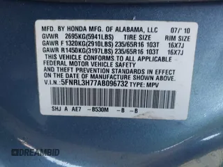 2010 Honda Odyssey EX-L with VIN 5FNRL3H77AB096732, listed as a IAAI auction lot 41831744 with 22,523 mi miles and . Bid and sale history available at DreamBid. Image 9.