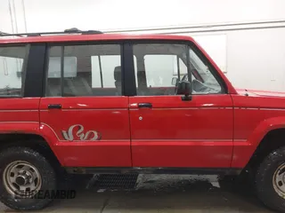 1991 Isuzu Trooper z VIN JACCH58R6M8905869, wystawiony jako IAAI lot #42394651 z przebiegiem 117 130 mil mil oraz . Historia ofert i sprzedaży dostępna na DreamBid. Obrazek 13.