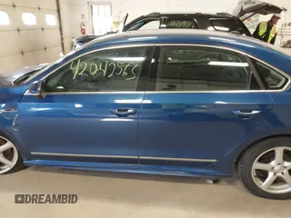 2017 Volkswagen Passat R-Line w/Comfort Pkg with VIN 1VWDT7A33HC033883, listed as a IAAI auction lot 42042563 with 410,105 mi miles. Bid and sale history available at carsss.com. Image 14.