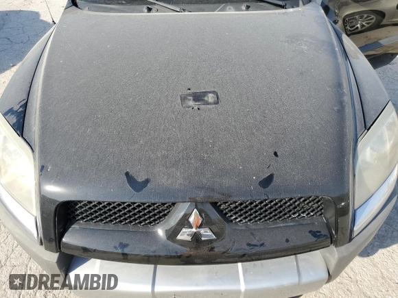 2006 Mitsubishi Raider z VIN 1Z7HT38K76S574856, wystawiony jako Copart lot #74367324 z przebiegiem 176 611 mil mil oraz Czysty tytuł • Clean title. Historia ofert i sprzedaży dostępna na DreamBid. Obrazek 11.