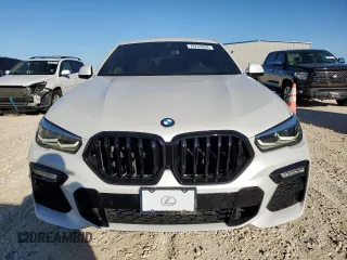 2021 BMW X6 sDrive40i z VIN 5UXCY4C01M9E24444, wystawiony jako Copart lot #79725094 z przebiegiem 119 066 mil mil oraz Czysty tytuł • Clean title. Historia ofert i sprzedaży dostępna na DreamBid. Obrazek 5.