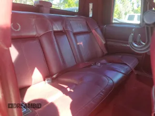 1991 Cadillac DeVille z VIN 1G6CD13B7M4306411, wystawiony jako Copart lot #50128155 z przebiegiem Nie podano mil oraz Szkoda całkowita • Salvage title. Historia ofert i sprzedaży dostępna na DreamBid. Obrazek 10.