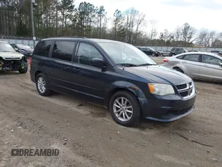 2014 Dodge Grand Caravan SXT with VIN 2C4RDGCG7ER265072, listed as a IAAI auction lot 41847504 with 254,633 mi miles and . Bid and sale history available at DreamBid. Image 1.